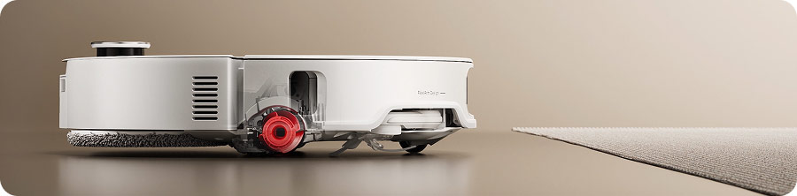 Roborock Qrevo CurvX перед тонким килимом